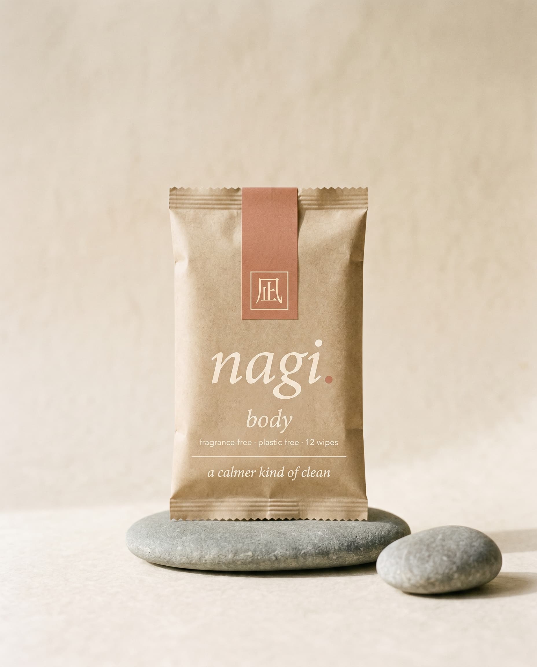nagi body — 100% cotton wipes on a smooth river stone